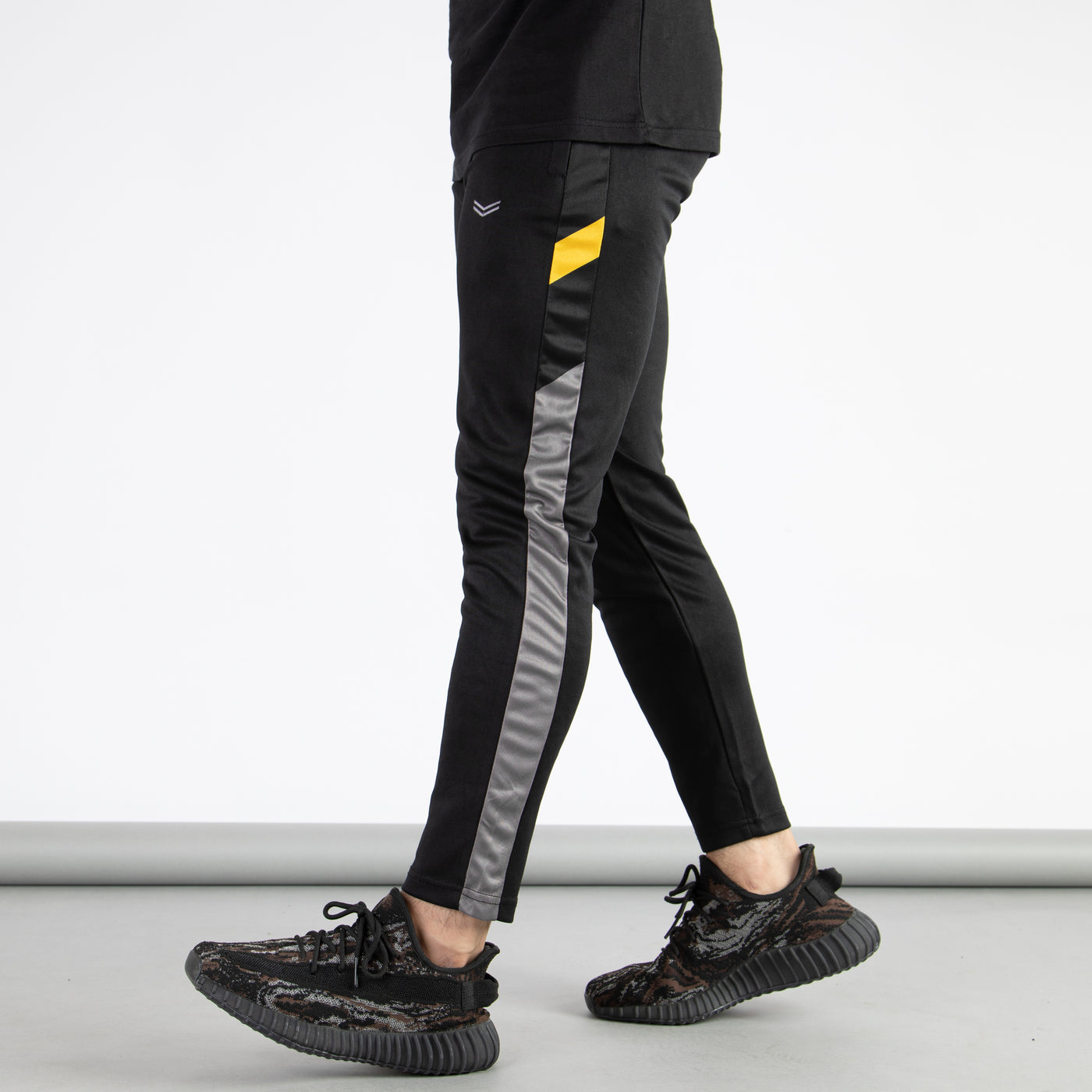 Black Quick Dry Bottoms with Gray & Yellow Sublimated Panel