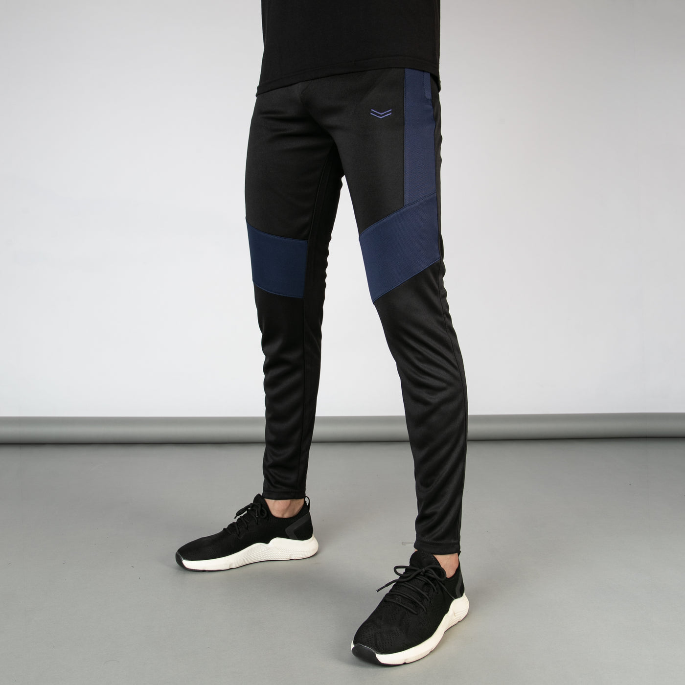 Black Quick Dry Versus Series Bottoms with Navy Mesh Panels